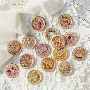 Pegatinas de sellos de cera vintage con diseños de flores y mariposas en tonos crema