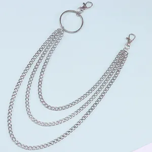 Detail of silver multi-layer punk waist chain with metal rings and lobster clasps