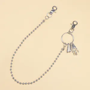 Chaîne de pantalon punk à billes argentées avec pendentif main squelette et mousquetons
