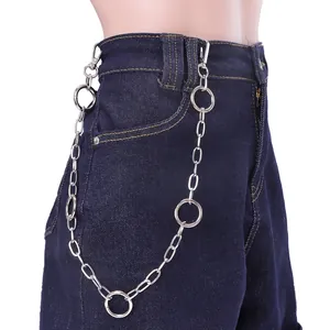 Silver metal pants chain with circular links and lobster clasps on denim jeans
