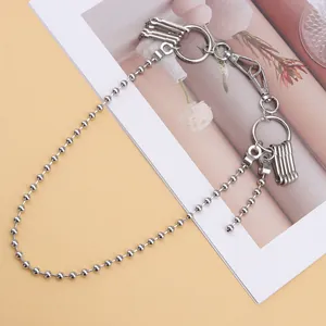 Silver bead chain accessory with metal rings and pins in punk street style