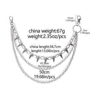 Detailed view of silver multi-layer punk waist chain with spiked rivet accents