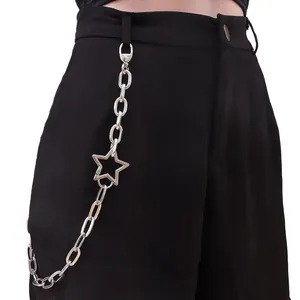 Silver metal pants chain with hollow star pendant and spring clasp on black trousers