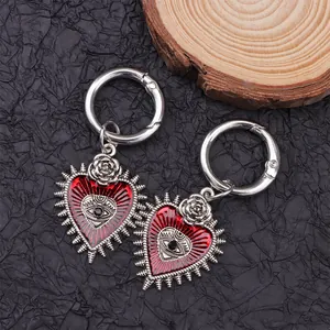 Macro view of gothic devil eye heart charms with metal rose for martin boots