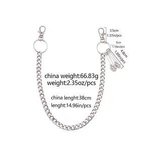 Detail view of hip hop pant chain with lobster clasps and safety pin pendants