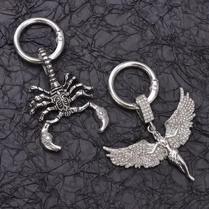 Gothic wings and scorpion boot accessories with silver finish and rhinestones