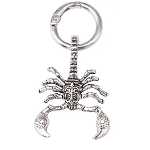 Gothic scorpion wing boot charm in retro silver metal with spring ring clasp