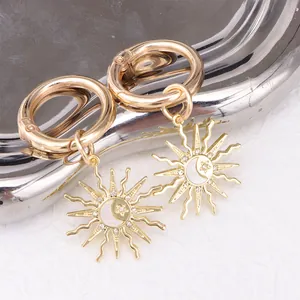 Golden sun moon and star shoe charms with shell inlay and cubic zirconia for boots