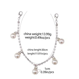 Detail view of 30cm rhinestone shoe chain with pearl charms and lobster clasps