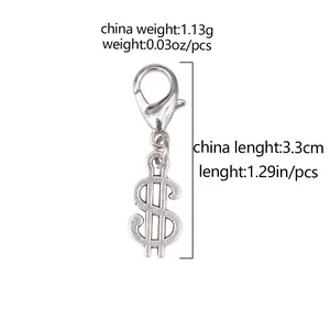 Macro detail of dollar sign pendant with dimensions showing 1.29 inch length