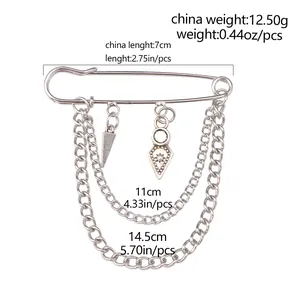 Silver retro lock brooch with double chains and sunburst pendant dimensions shown