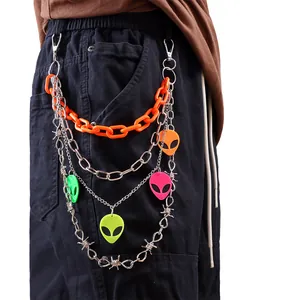 Punk multi-layered waist chain with orange plastic links and colorful alien charms
