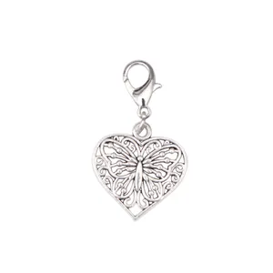 Silver hollow heart charm with butterfly filigree detail and lobster clasp for shoes