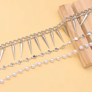 Three-piece hat accessory set with silver spikes, heart chains, and white pearls