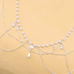 Vintage silver body chain with multi-layer metal links and elegant white pearls decoration