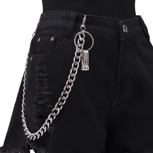 Silver metal multilayer chain with hoop and pins on black ripped denim shorts