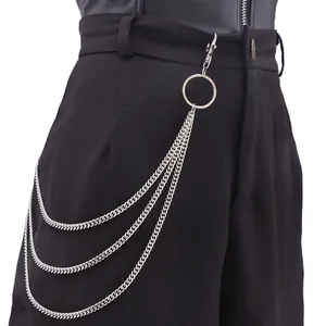 Three-layer hip hop metal waist chain with ring pendant on black pants side view