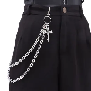 Detail of silver skull and sword charms on a multi-layer punk hip hop wallet chain