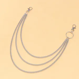 Close-up of triple-layered silver punk waist chain with lobster clasps and metal ring