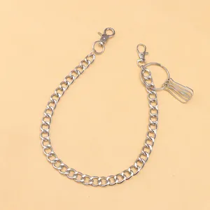 Detail of silver metal pant chain featuring lobster clasps, key ring and pin hooks