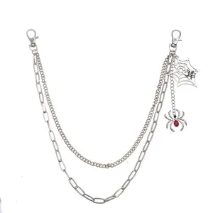 Multi-layer spider web pants chain with silver metal links and red rhinestone details