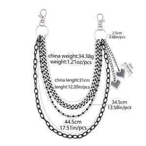 Detail view of multi-layer metal pants chain with black heart pendants and size specs