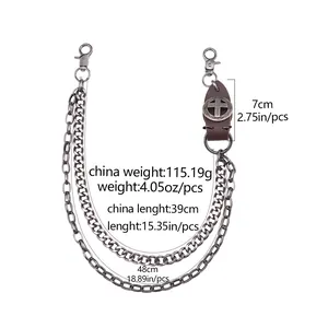 Detailed view of double layered punk waist chain with leather cross patch and lobster clasps