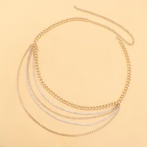 Multilayer gold body chain with curb link design and sparkling rhinestone tassels