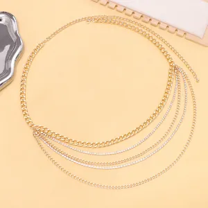 Chic multi-layered gold body chain with shimmering rhinestones and Cuban link detail