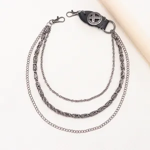 Punk style triple layer silver trousers chain with vintage cross badge and leather detail