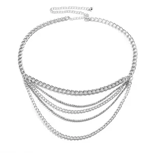 Close-up of layered silver body chain with sparkling rhinestones and lobster clasp