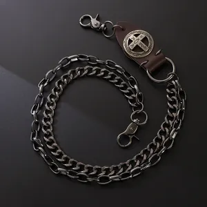 Close-up of double layer metal wallet chain with leather cross badge and lobster clasps