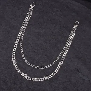 Close-up of double-layered silver barbed wire punk wallet chain with lobster clasps