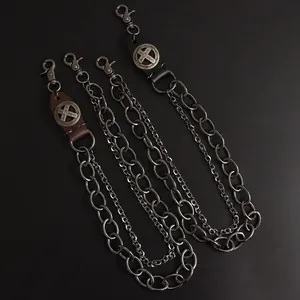 Vintage industrial metal wallet chain with leather cross accent and lobster clasps