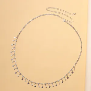 Detailed view of silver body chain featuring star pendants and sparkling rhinestones