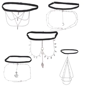 Five assorted elastic leg chains with silver charms featuring snakes, moons, and rhinestones