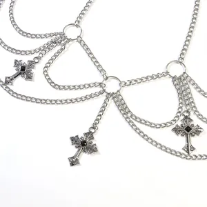 Silver multilayer metal body chain featuring hollow rings and gothic cross pendants