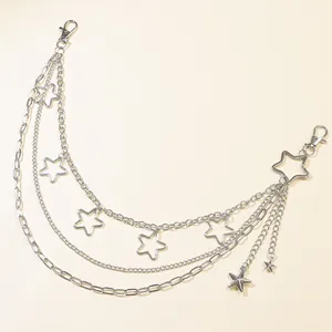 Detail of silver multi-layer star waist chain with hollow pendants and lobster clasps