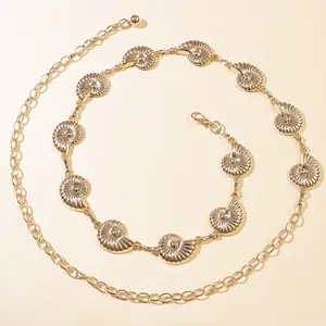 Elegant gold metal waist chain featuring seashell charms and adjustable lobster clasp