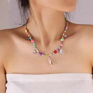Bohemian colorful beaded necklace set with shell, dolphin and heart charms for women