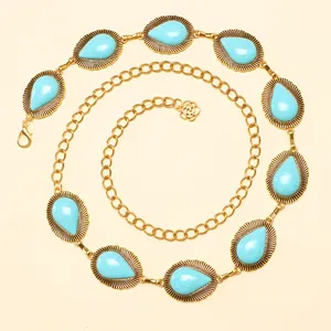Bohemian gold waist chain with oval turquoise pendants and flower tassel charm