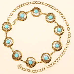 Bohemian gold metal waist chain featuring sunburst flower medallions and turquoise stones