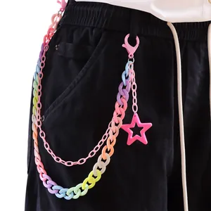 Double-layered colorful acrylic waist chain with star pendant on black cargo pants
