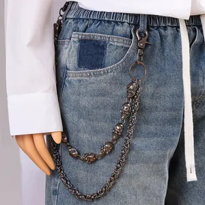 Detail view of double-layer punk skull pants chain with heavy metal links in gun black