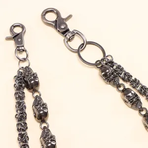 Dual-layer punk trousers chain with skull charms and lobster clasps in vintage silver