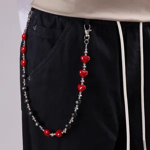 Cadena de pantalón gótica con cuentas de corazón rojo y piedras ojo de gato en pantalón
