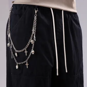 Punk hip-hop double-layer metal wallet chain with skull and cross charms on cargo pants