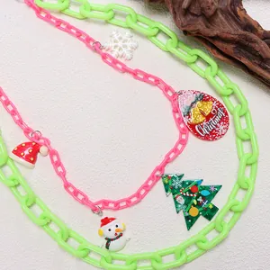 Detail of double-layer acrylic pants chain with colorful Christmas snowman and tree charms