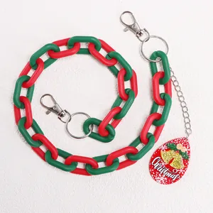 Christmas themed pants chain with red and green frosted acrylic links and bell charm