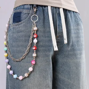 Detail of multi-colored M-letter beads and double-layered metal hip-hop pants chain